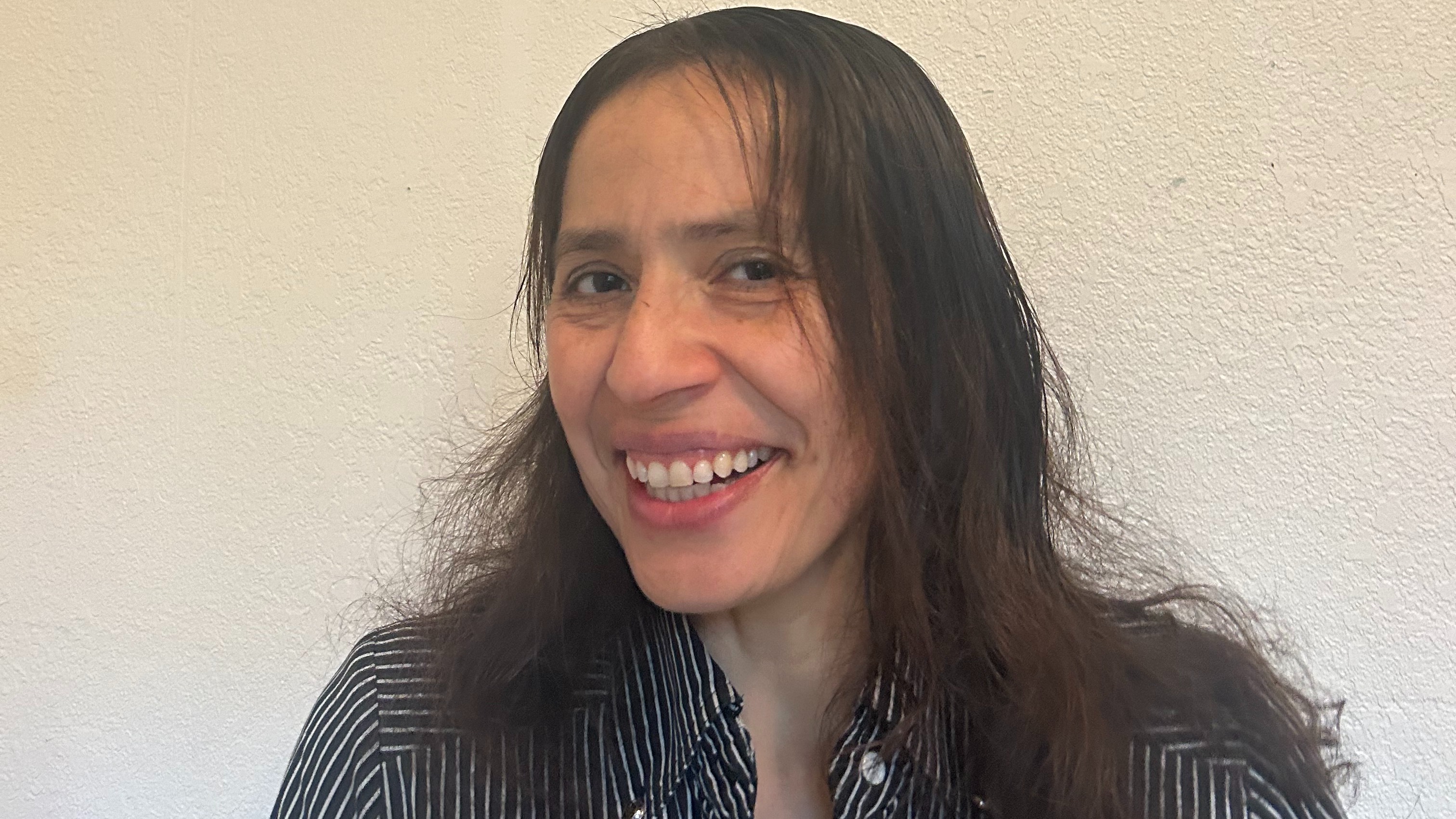 Angela E.